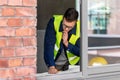 male architect with blueprint working at office Royalty Free Stock Photo