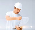 Male architect looking at blueprint Royalty Free Stock Photo