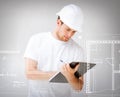 Male architect looking at blueprint Royalty Free Stock Photo