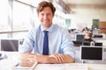 Male architect sitting at his desk in an office Royalty Free Stock Photo