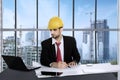 Male architect working with blueprints in the office Royalty Free Stock Photo