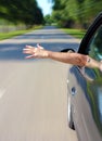 Male arm sticking out of the car Royalty Free Stock Photo