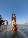 Male artist act as lord shiva with painted face during masaan holi in varanasi