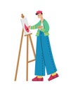 A male artist paints a picture on an easel. Creative professions