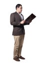 Male Asian businessman standing and holding document paper, full body length portrait isolated on white Royalty Free Stock Photo