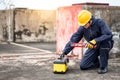 Male Asian mechanic preparing work tool at site Royalty Free Stock Photo