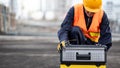 Male Asian mechanic preparing work tool at site Royalty Free Stock Photo