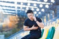 Male asian runner has severe chest pain, heart ache after running and training, calling an ambulance calls a doctor quickly Royalty Free Stock Photo