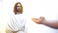 Male asking God for blessing and forgiveness, Jesus standing in holy light Royalty Free Stock Photo