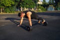 Male athlete doing push-ups outdoors, bodyweight athlete training Royalty Free Stock Photo