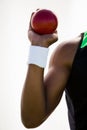 Male athlete holding shot put ball Royalty Free Stock Photo