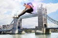 Male Athlete hurdling Tower Bridge Royalty Free Stock Photo