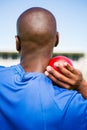 Male athlete preparing to throw shot put ball Royalty Free Stock Photo