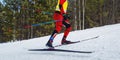 male athlete skier running skiing uphill cross country skiing