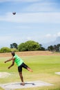 Male athlete throwing shot put ball Royalty Free Stock Photo