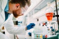 Handsome student of chemistry working in laboratory Royalty Free Stock Photo