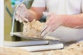 Male baker baking bread Royalty Free Stock Photo