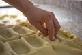 Male baker prepares cake