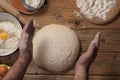 Male baker prepares homemade bread Royalty Free Stock Photo