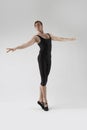 Male Ballet Dancer Flexible Athletic Man Posing in Black Tights in Ballanced Dance Pose With Hands Horizontal