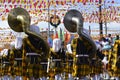 Male band member play bass horn on street during the annual brass band exhibition