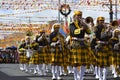 Male band member play trumphet on street during the annual brass band exhibition