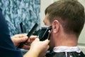 Male barber at work Royalty Free Stock Photo