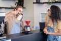 Male barista brewing coffee using pourover Royalty Free Stock Photo