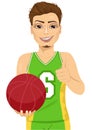 Male basketball player holding ball