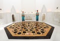 Male bath attendants in a Turkish bath