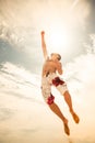 Male beach volleyball game player jump on hot sand Royalty Free Stock Photo