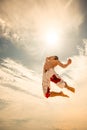 Male beach volleyball game player jump on hot sand Royalty Free Stock Photo