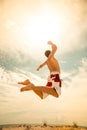 Male beach volleyball game player jump on hot sand Royalty Free Stock Photo