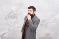 Male beauty standards. Menswear concept. Elegant and stylish hipster. Bearded man thinking outdoor. man autumn style Royalty Free Stock Photo