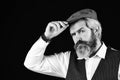 Male beauty standards. Portrait of mature man in victorian gangster outfit. bearded man hipster isolated on black. male Royalty Free Stock Photo