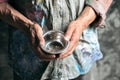 Male beggar hands seeking food or money at public path way Royalty Free Stock Photo