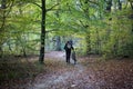 Male bicyclist in autumn park