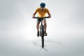 The bicyclist on gray, studio shot.