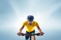 The bicyclist on gray, studio shot.