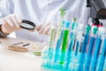 The male biochemist working in the lab on plants Royalty Free Stock Photo