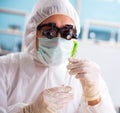 Male biotechnology scientist chemist working in the lab