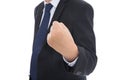 Male in black suit makes an effort gesture with his left hand fisted Royalty Free Stock Photo