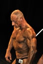 Male bodybuilding contestant showing his best