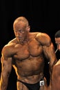 Male bodybuilding contestant showing his best