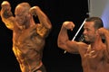 Male bodybuilding contestant showing his best