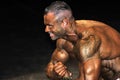 Male bodybuilding contestant showing his best