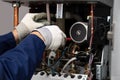 male boiler technician repairing Royalty Free Stock Photo