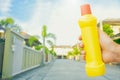 male with bottle for cleaning staff in home blurred background Metaphor for cleaning Get rid of germs In bathroom, home office or Royalty Free Stock Photo