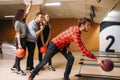 Male bowler throws ball, throwing in action Royalty Free Stock Photo