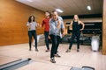 Male bowler throws ball on lane, strike shot Royalty Free Stock Photo